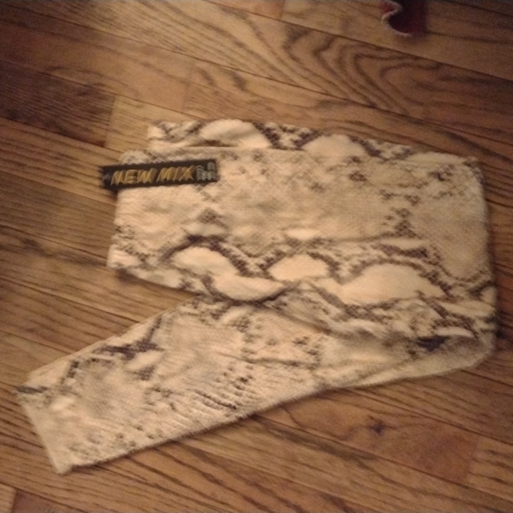 These are new mix one size fits all snake skin style fabric print leggings